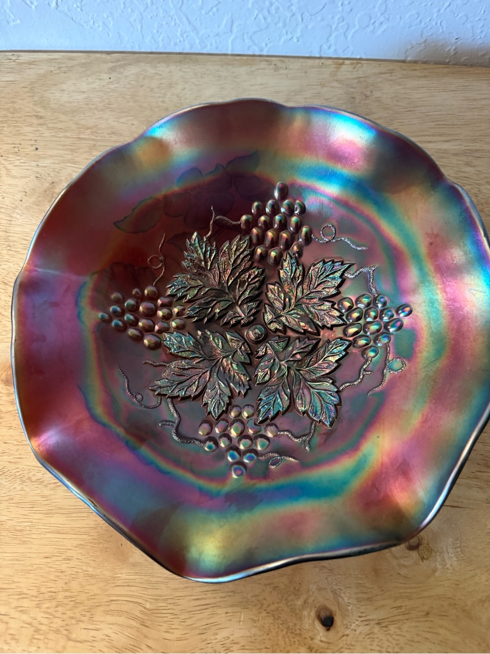 Northwoods Grape Leaves Carnival  glass ruffled bowl.